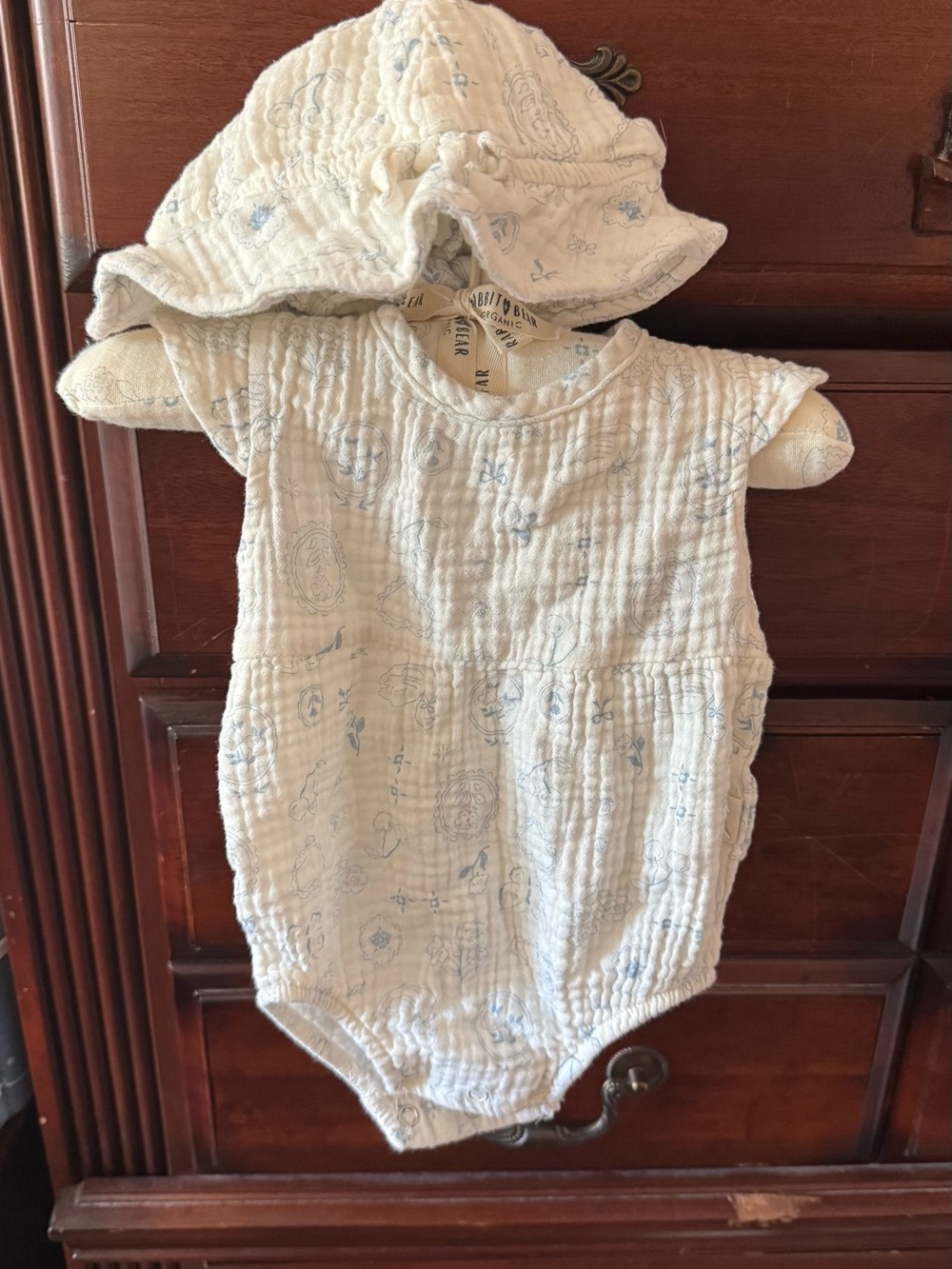 Organic Cotton One-Piece Bodysuit with matching hat in Cream with Blue Print